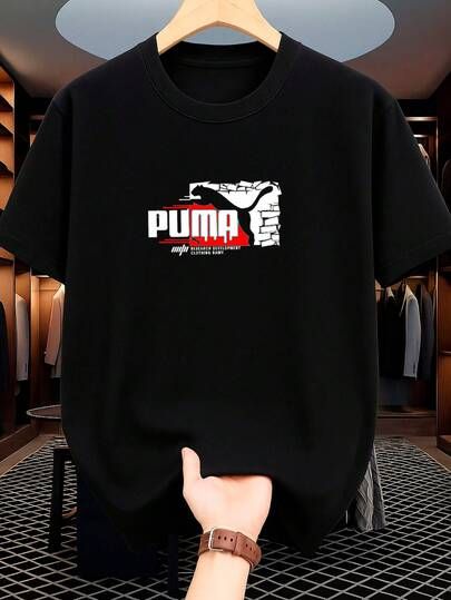 dce1af5bf1f0afed6ae9265a477c020d PUMA Graphic Printed Oversized Black T-Shirt - Image 1
